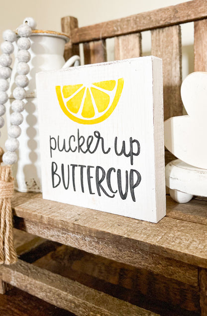 Pucker Up Buttercup sign